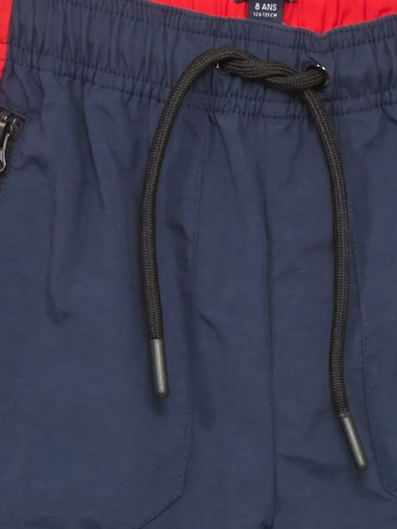 BERMUDAS CON CREMALLERAS  NEGRO