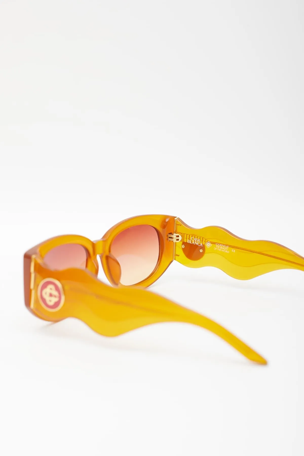 CASABLANCA ORANGE OVAL WAVE SUNGLASSES