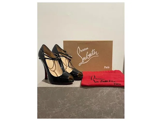 CHRISTIAN LOUBOUTIN Tacones T.UE 37 Cuero Negro 