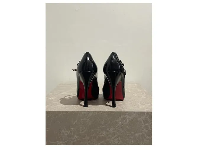CHRISTIAN LOUBOUTIN Tacones T.UE 37 Cuero Negro 