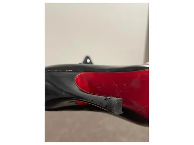 CHRISTIAN LOUBOUTIN Tacones T.UE 37 Cuero Negro 