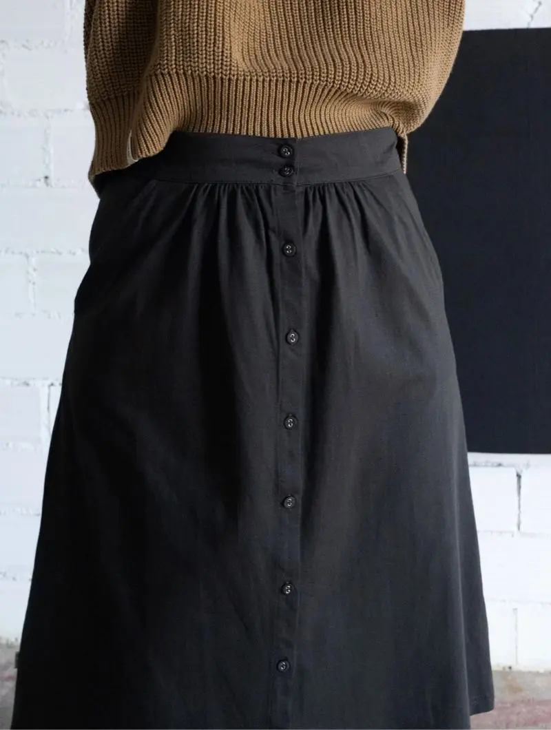 Falda midi lisa de algodón orgánico