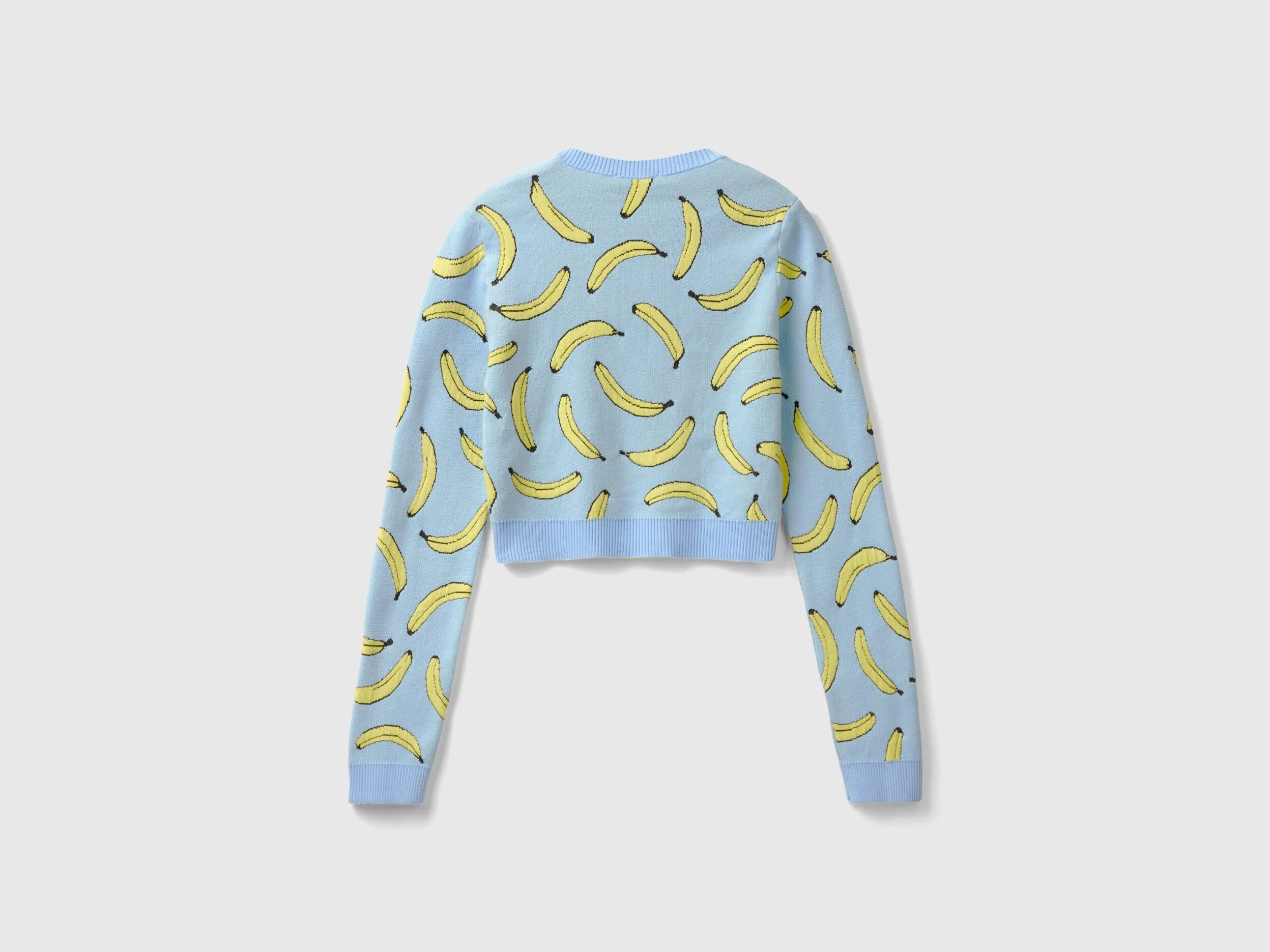 Jersey cropped celeste con estampado de plátanos