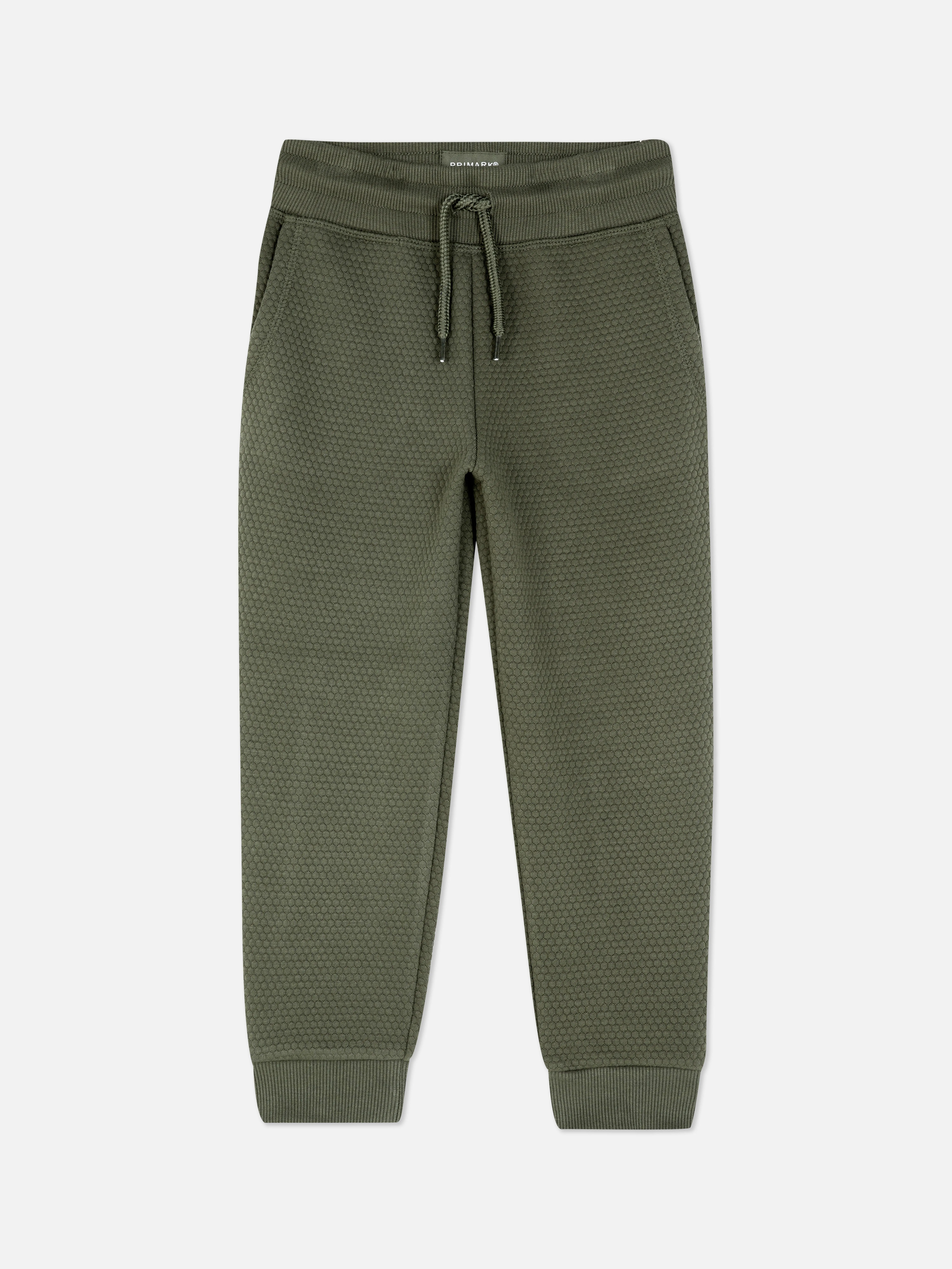 Joggers con textura y diseño geométrico
