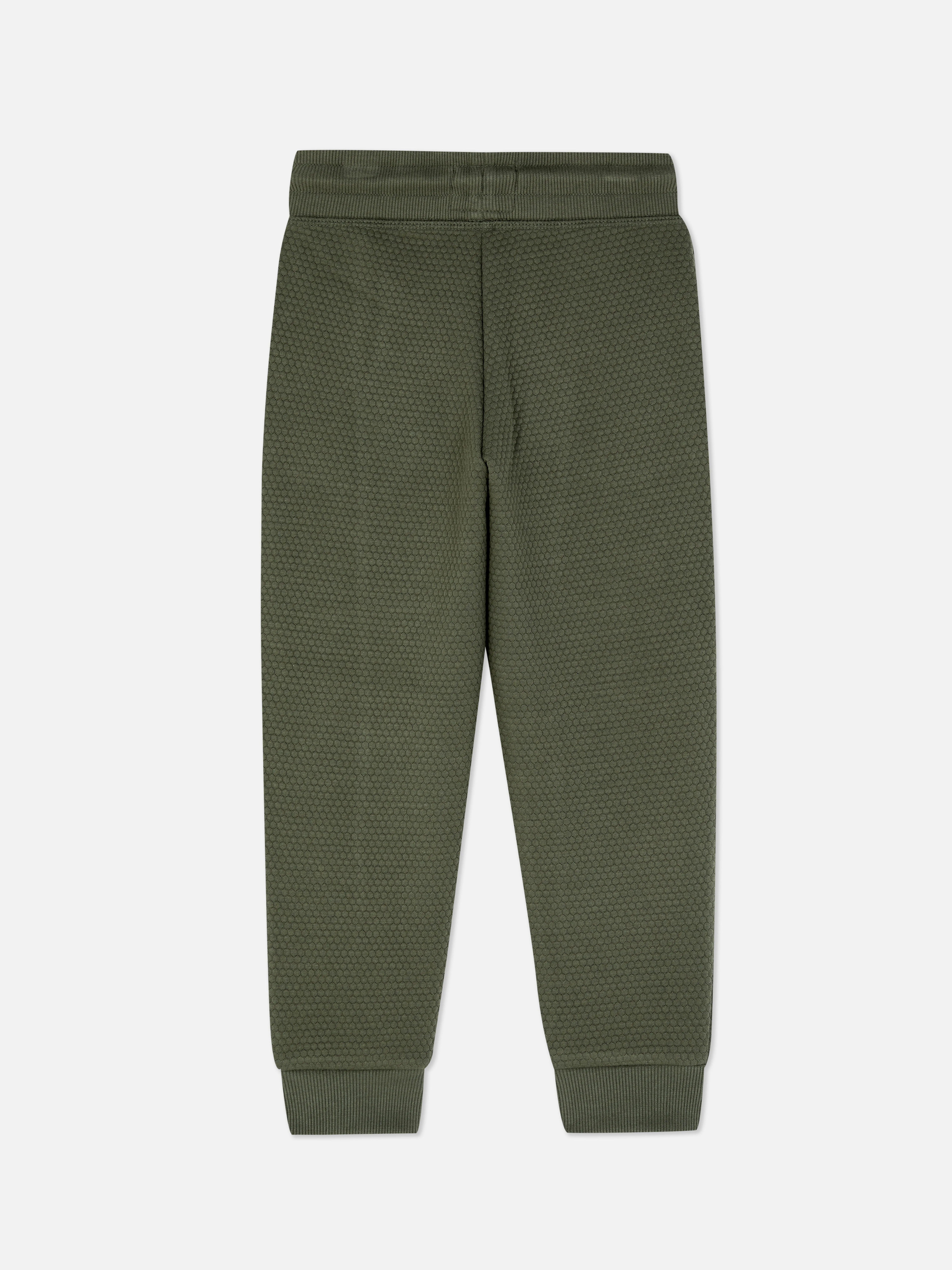 Joggers con textura y diseño geométrico