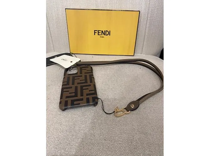 Monederos FENDI, carteras y estuches T.  cuero Castaño 