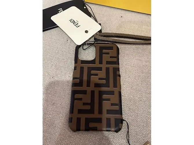 Monederos FENDI, carteras y estuches T.  cuero Castaño 
