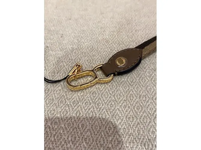 Monederos FENDI, carteras y estuches T.  cuero Castaño 