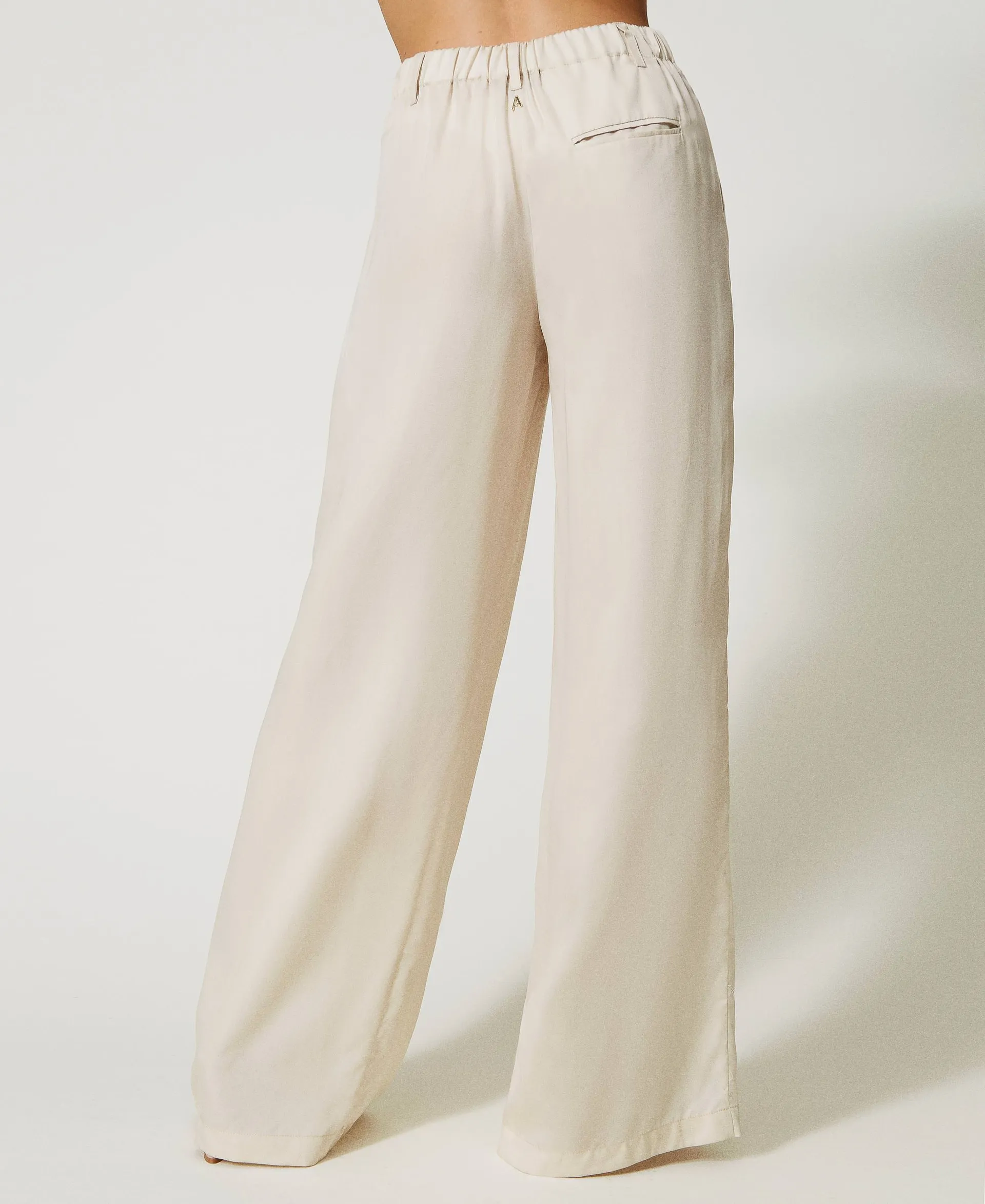 Pantalón palazzo con pliegues