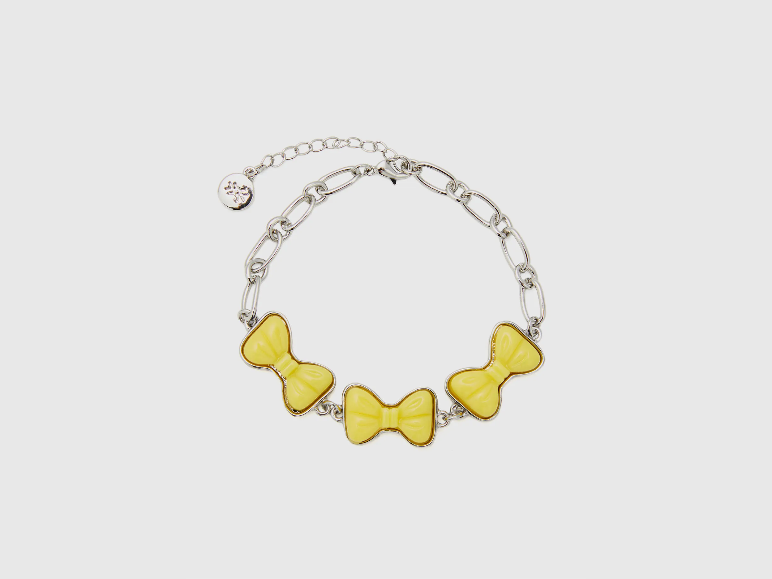 Pulsera con lazos amarillos