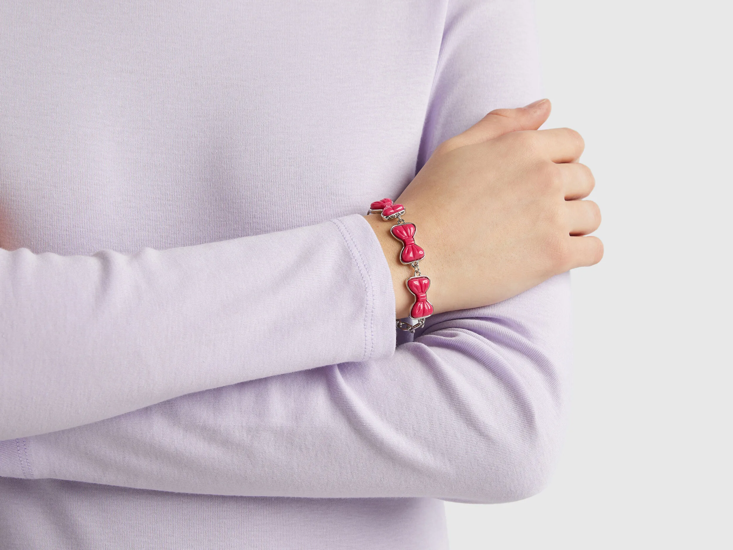 Pulsera con lazos fucsias