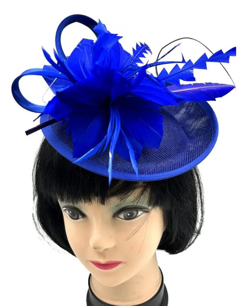 TOCADOS AZULONES CON DISEÑO ELEGANTE DE PLUMAS PARA BODAS